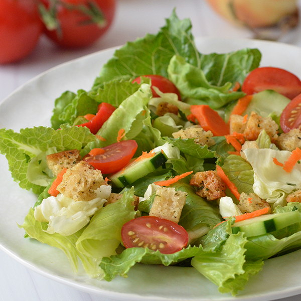 A prepared salad topped with Aleia's Gluten-Free Seasoned Salad Croutons image